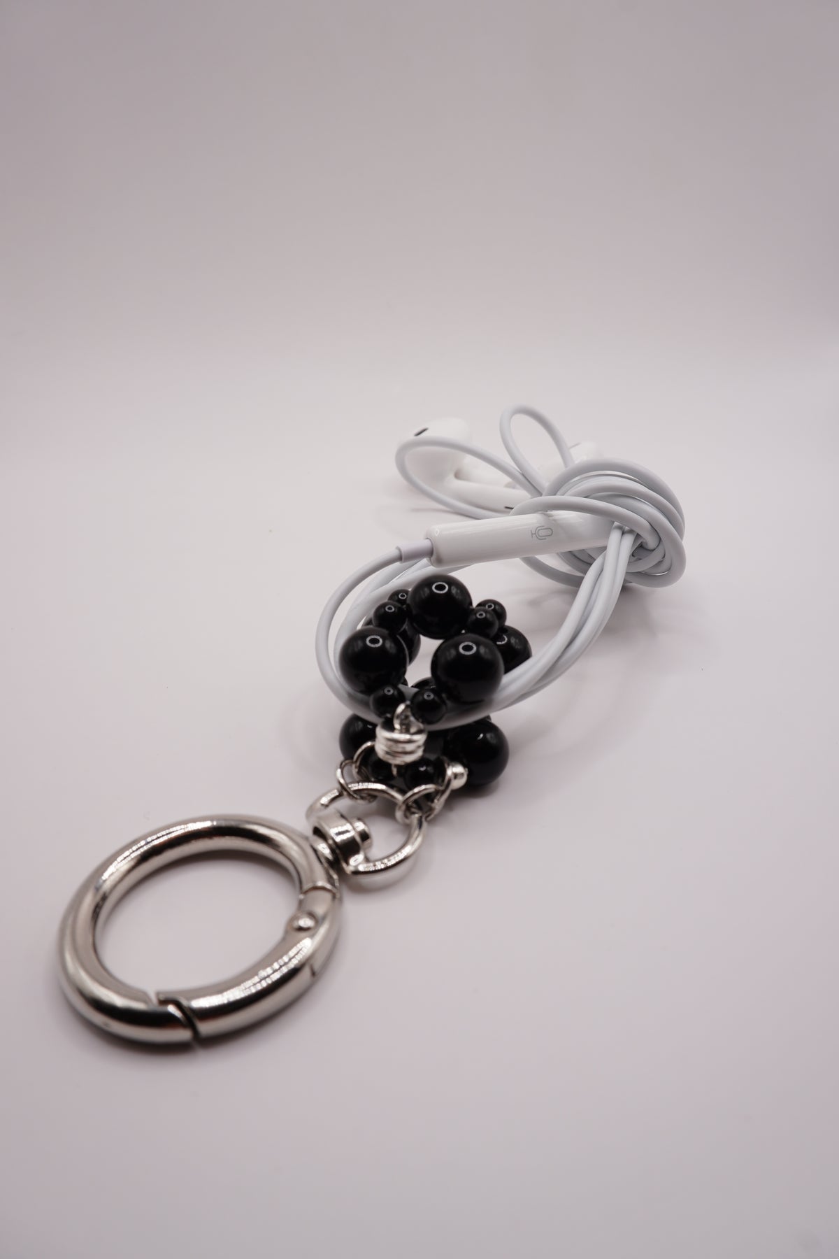 Wired earphone charm