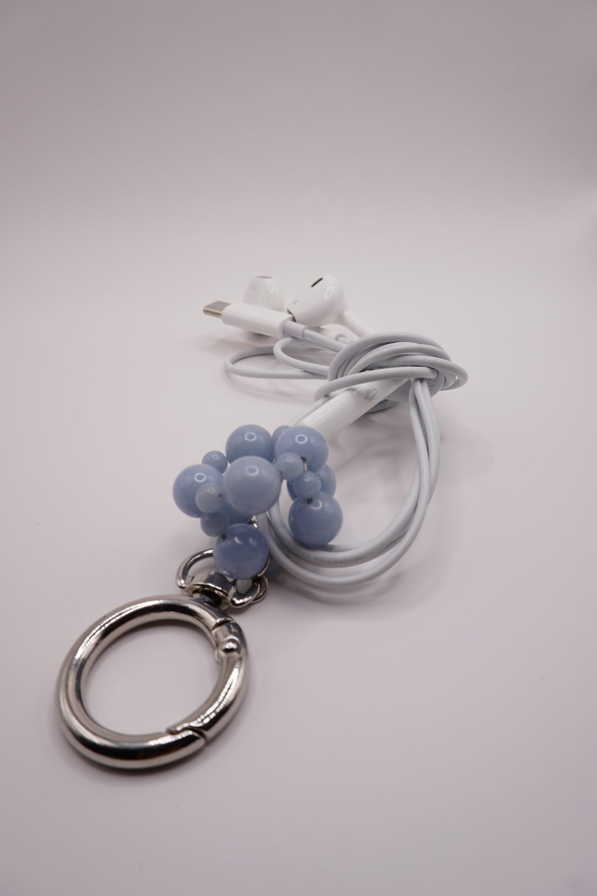 Wired earphone charm
