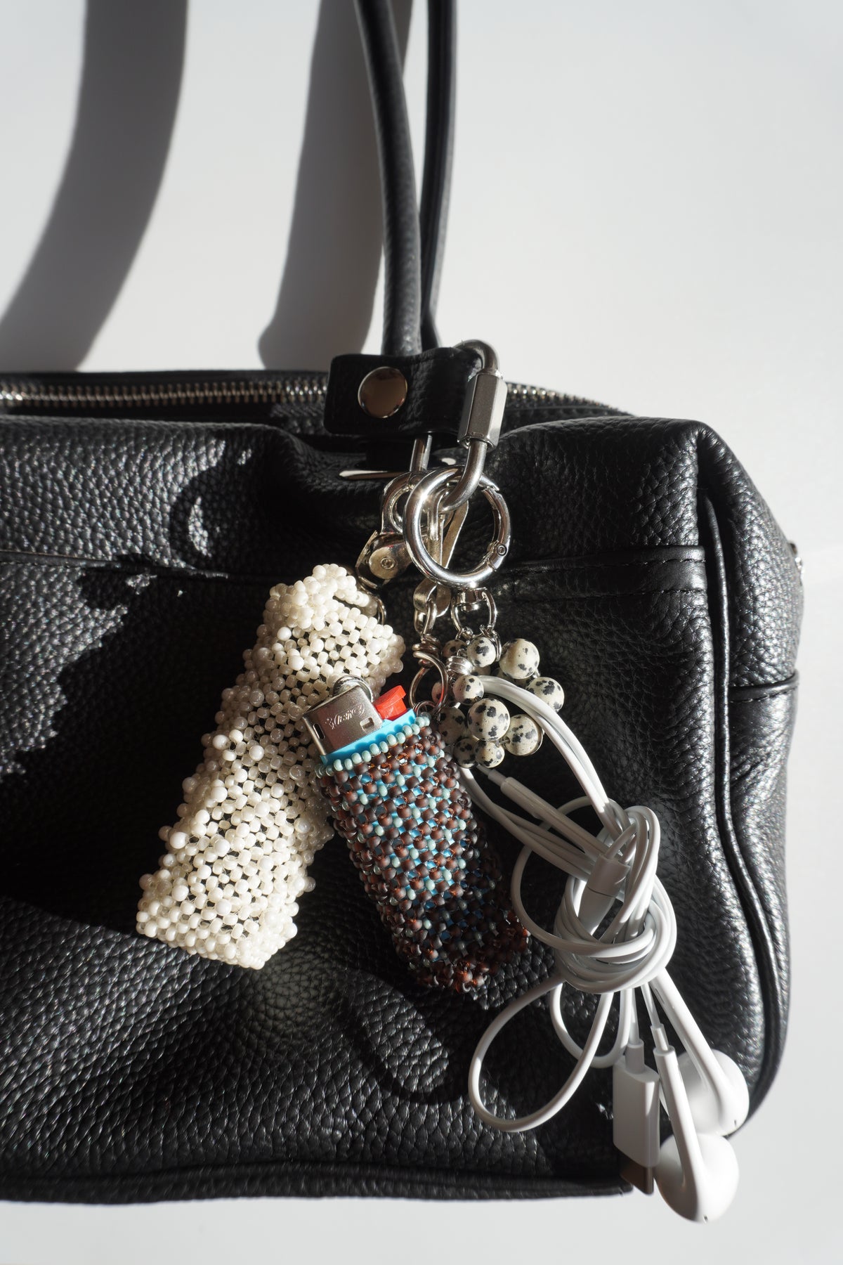 Wired earphone charm