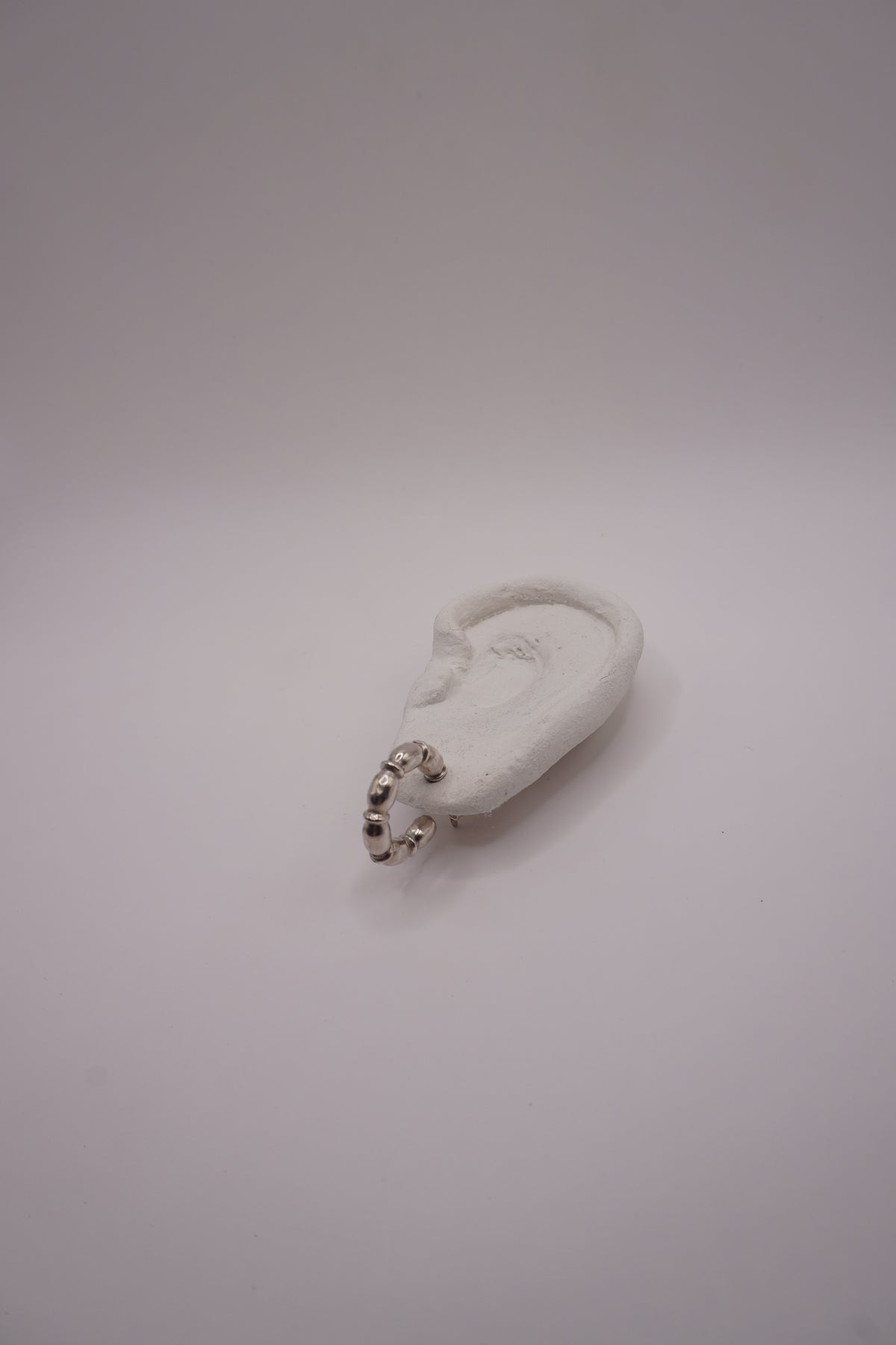 Linked oval piece