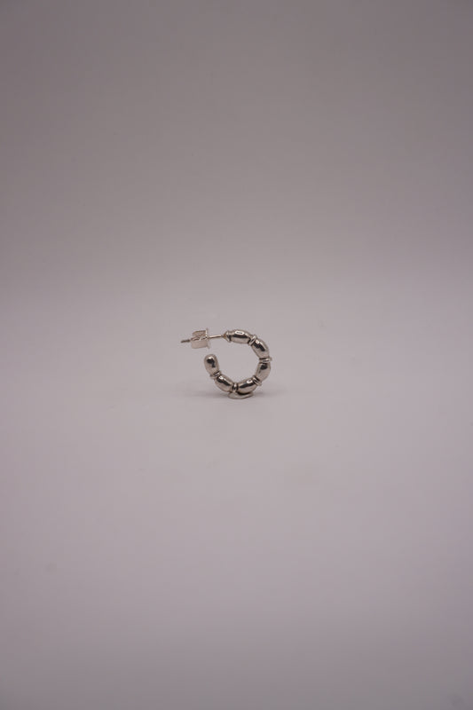 Linked oval piece